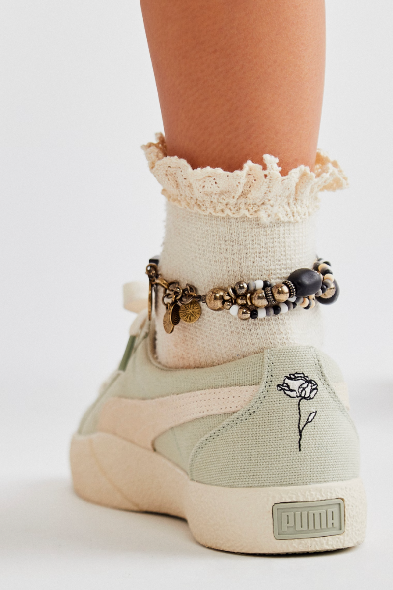 Trestles Clothing Company waffle knit crew socks with delicate crochet lace trim worn with a beaded ankle bracelet